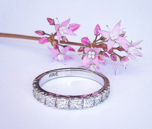18K white Gold and Diamond half eternity engagement ring